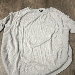 Cropped sweater with detailed arms